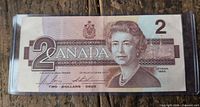 Obverse of $2 Canadian banknote with Queen Elizabeth II