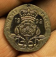 Reverse showing crowned English rose, date 1999 and denomination 20 PENCE