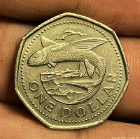 Reverse showing flying fish design and ONE DOLLAR text