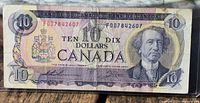 Obverse of 1971 $10 note showing portrait, denomination, serial