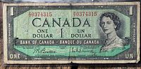 Obverse of 1954 Canadian one-dollar note showing serial number 00374315 and Queen Elizabeth II portrait