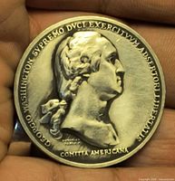 Obverse of pewter medallion showing Washington bust and surrounding Latin text