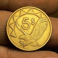Reverse of coin with 5 $ and African Fish Eagle
