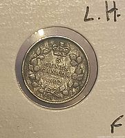 Reverse side showing 5 CENTS CANADA 1902 within wreath and crown