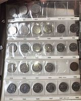 Binder page with coins 1923-1948 including 1926 Far 6, 1942 Tombac, 1947 Maple Leaf