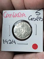 Reverse side showing 1924 date, numeral 5, maple leaves in holder