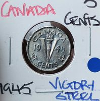 Reverse showing 1945 torch V design