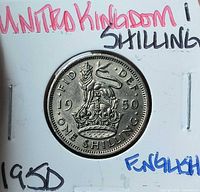 Reverse with crowned English lion, clear date 1950