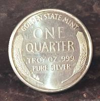 Reverse side showing inscriptions and wheat design