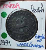 Obverse of 1854 Bank of Upper Canada One Penny token in flip
