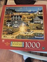Front of boxed Charles Wysocki 1000-piece puzzle