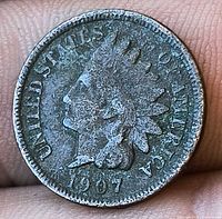 Obverse showing date 1907, portrait, dark toning