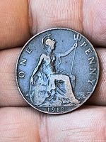 Reverse showing seated Britannia, denomination and date