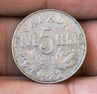 Reverse showing CANADA FIVE 5 CENTS, maple leaves, 1922
