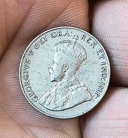 Obverse showing King George V portrait and legend GEORGIVS V DEI GRA REX ET IND IMP