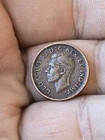 Obverse showing King George VI portrait and legend