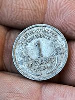 Reverse view showing denomination, date and motto