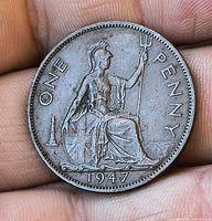 Reverse showing seated Britannia, date 1947 and ONE PENNY legend