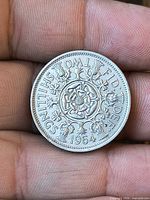 Reverse showing floral design and date 1964