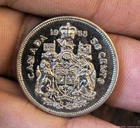 Reverse Canadian Coat of Arms with date and denomination visible