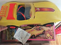 Left side view of yellow Super Vette with instruction sheet visible
