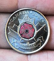 Reverse showing colourized poppy design, inscriptions and maple leaves