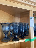 Goblets and dessert glasses on shelf