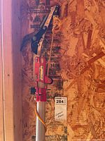 Kamaki pole pruner showing full upper section mounted on wall