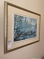 Framed print on wall showing full artwork and frame