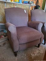 Front view of brown reclining armchair