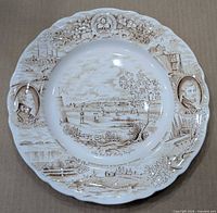 Full view of scalloped brown transferware Ontario souvenir plate