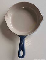 Top view showing cream interior and pour spouts