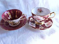 Both teacup and saucer pairs front view