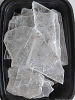 Tray of multiple translucent selenite slabs
