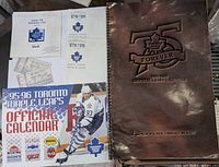 Overview of lot showing both calendars and promotional pieces