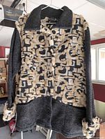 Front view of tub design faux fur coat hanging