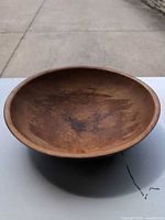 interior of wooden dough bowl showing patina