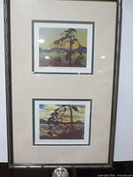 Full view of frame showing both prints