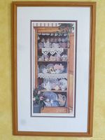 Full view of framed limited edition print in wood frame