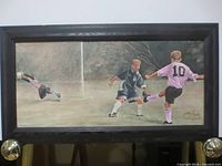 Front view of framed John Newby soccer limited edition print