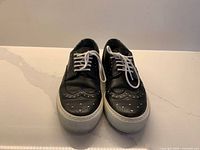 Top view of sneakers showing uppers and laces