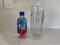 Vase beside Fiji water bottle for scale