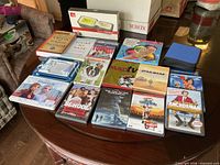 All discs laid out on table showing titles and cases