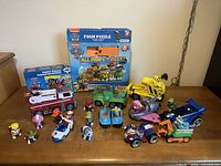 Group shot of all PAW Patrol toys and puzzles