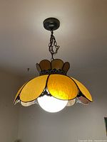 Full view of hanging stained glass pendant light