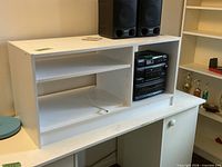 white laminate hutch front view on desk