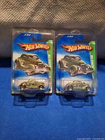 Both sealed Hot Wheels Neet Streeter cars front view