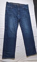 Dark blue denim jeans front view