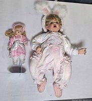 Both dolls side by side for scope and comparison