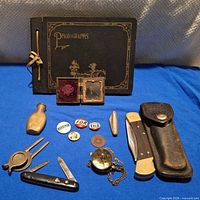 Overview of all items laid out on blue cloth